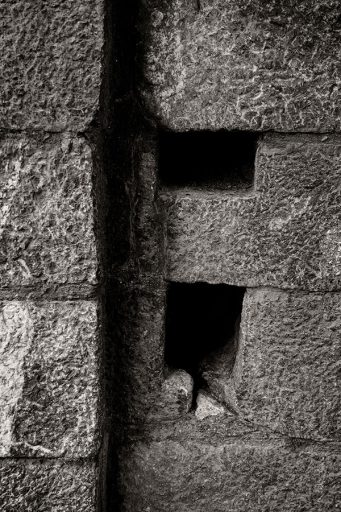 Wholes at the entrance gate at Cathar castle Montségur, France.