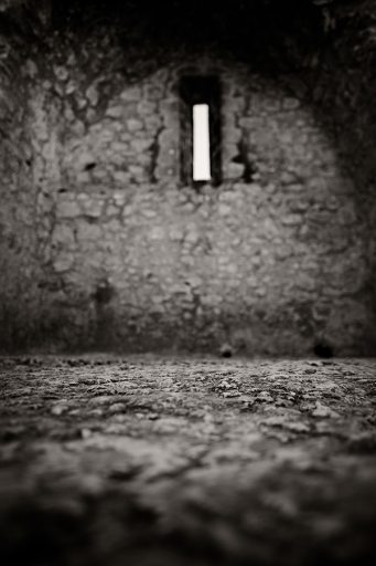 Window and floor in the Cathar castle Peyrepertuse, France.