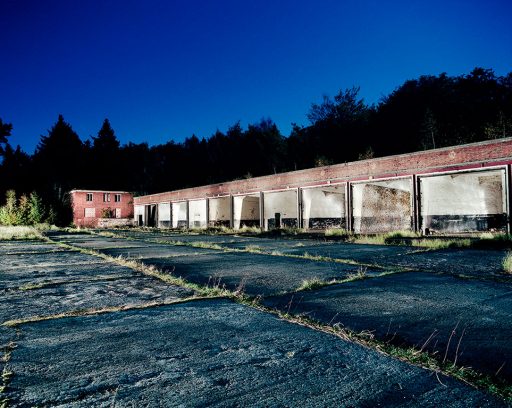 Abandoned airport Pütnitz, garages for the officers.