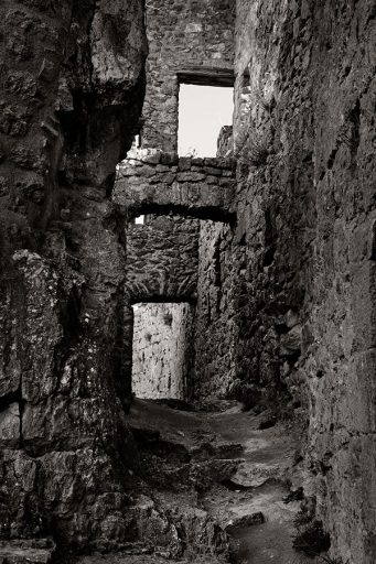 Narrow entrance in the Cathar castle Puilaurens, France.