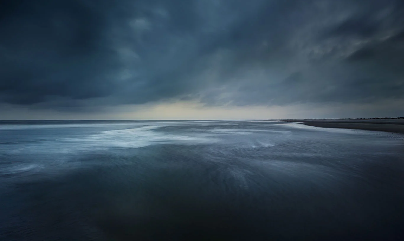 dark sea of the North Sea at the Nordstrand beach of the island Norderney