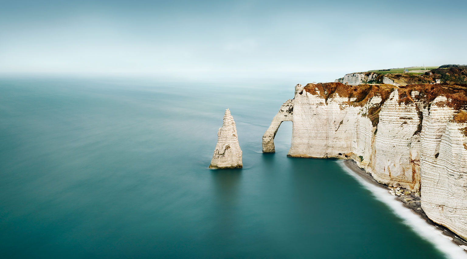 Steep coast Falaise d'Aval near Etretat on the Atlantic coast in France.