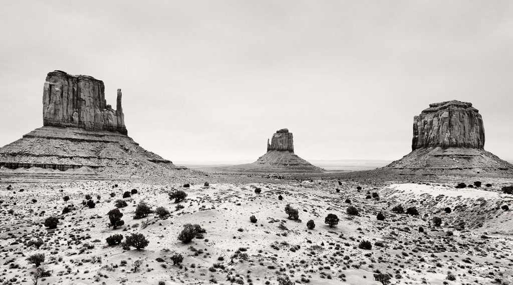 Monument Valley and the three rock formations West Mitten Butte, East Mitten Butte and Merrick Butte.